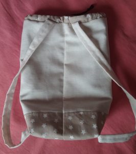 Sac baluchon sac à dos avion beige marron dos